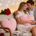 Coussin Amore en forme de cœur rose poudré